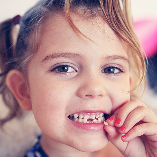 Planning for Your Child's First Loose Tooth - Dovey Dental - Dovey Dental -