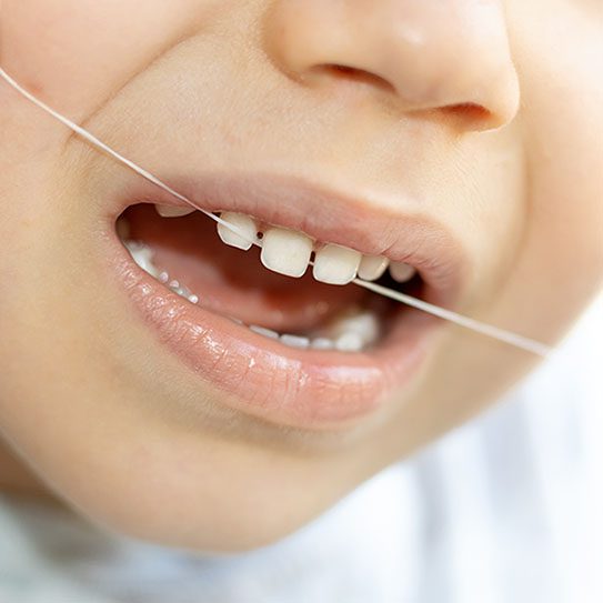 Jumpstart Your Child's Lifetime Flossing Habit - Dovey Dental - Dovey Dental -
